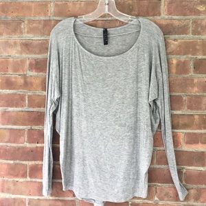Jolie gray flowy top. Never worn.